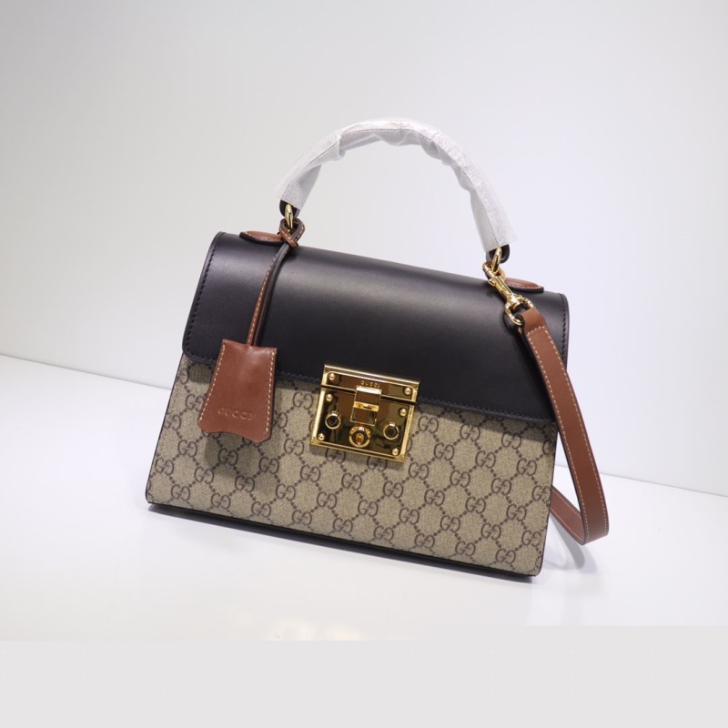 G*u*i top handle bags
